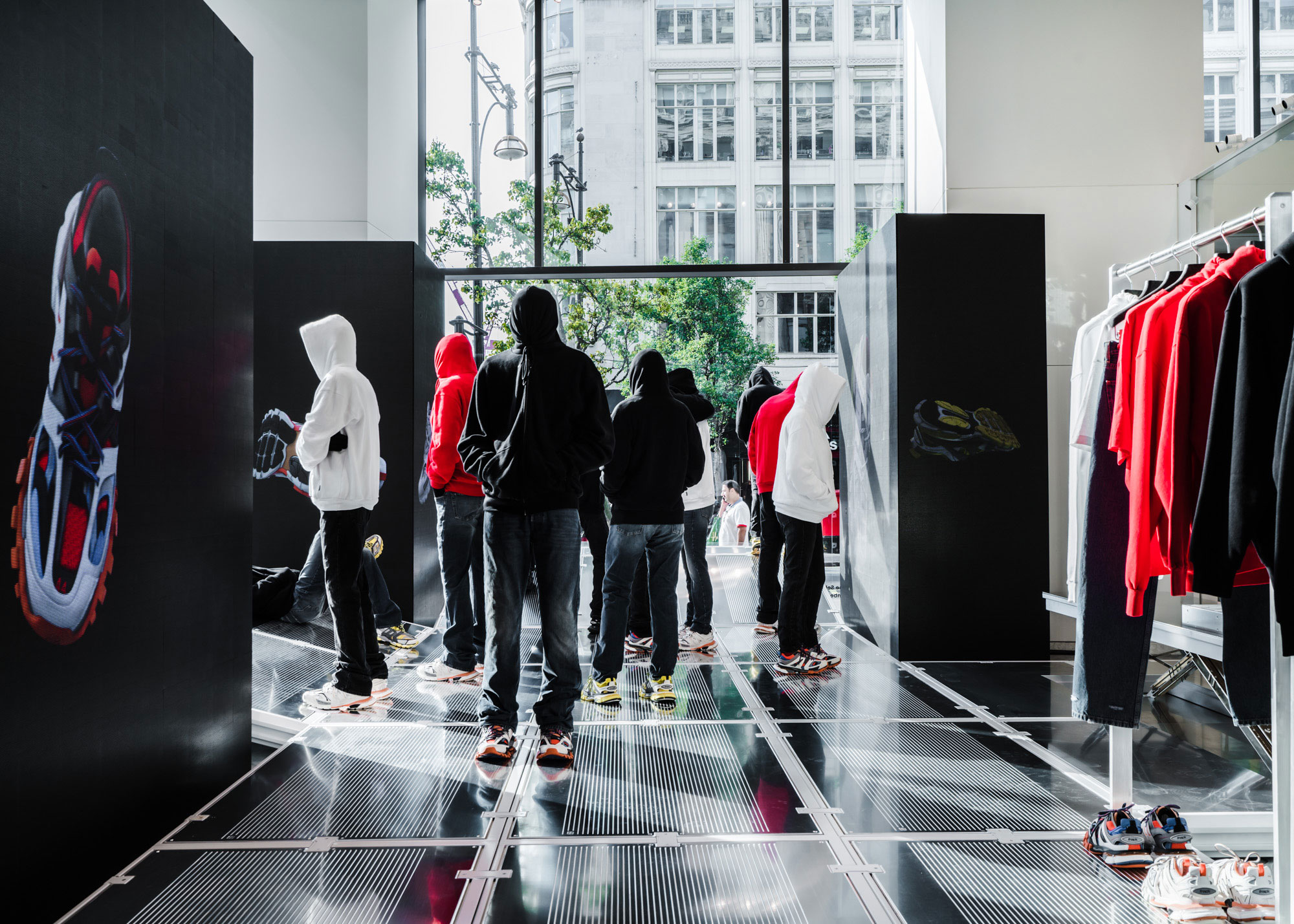 YAP Digital Assets displayed in a Balenciaga store